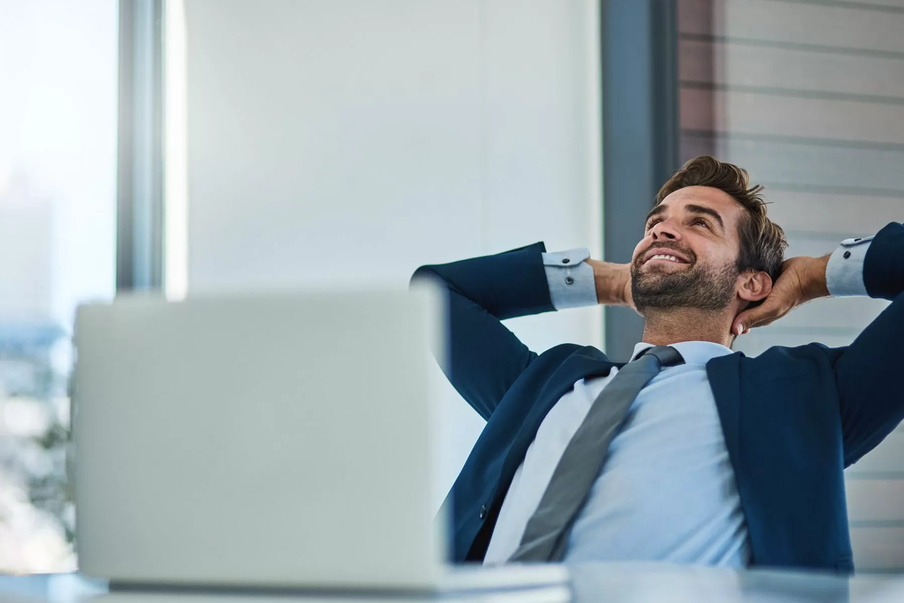 Man Sitting Back And Relaxing